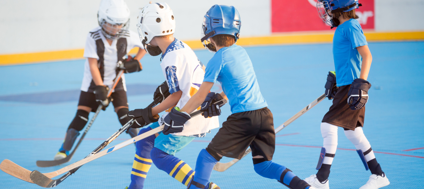 Team players having competitive hockey game